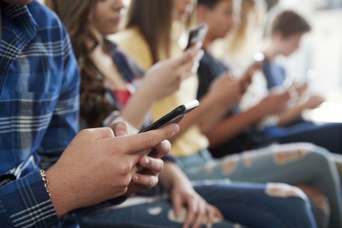 Watchdog group warns parents about Spotify's new DM feature